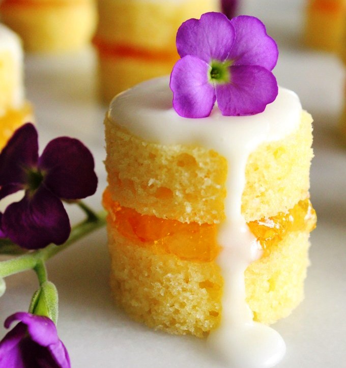 These mini naked cakes filled with sweet and tangy orange marmalade and garnished with fresh flowers are an elegant treat for a springtime brunch. They may look fancy, but they're simple to make.