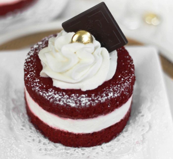 This cake recipe is my go-to Red Velvet sponge roll, but instead of rolling it up, I’ve used a pastry ring to cut the sponge sheet into 3″ stackable rounds.