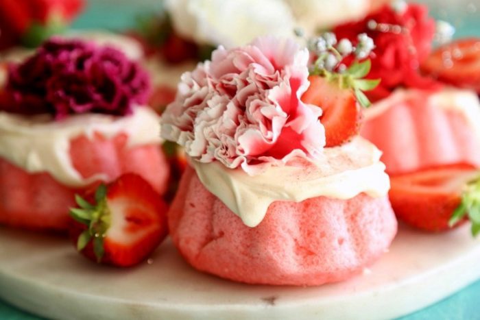 These Strawberry Mini Bundt Cakes with White Chocolate Ganache are simple but beautiful cakes bursting with strawberry flavor and covered in a creamy white chocolate ganache.