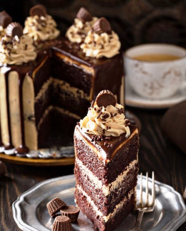 This Chocolate Peanut Butter Cake is an extra moist, rich, three layer chocolate cake with creamy peanut butter frosting and a sweet chocolate glaze on top