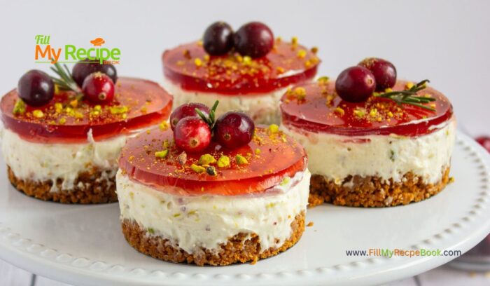 Easy mini no bake pistachio cranberry cheesecake fridge tart with a biscuit base. A creamy dessert with a nutty and fruity twist.