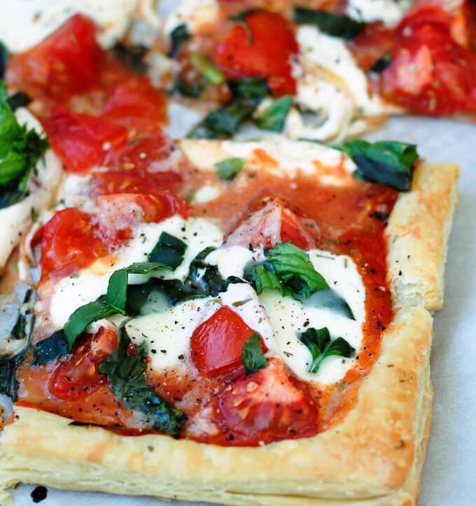 This Tomato Basil Mozzarella Puff Pastry Tart recipe is an easy, Summer-y, and savory meal to make. No pizza dough-making required