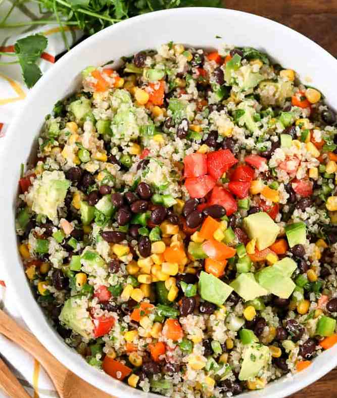 Black Bean Quinoa Salad an easy fresh salad that can be enjoyed as a meal or a side! Deliciously simple, full of fresh veggies and loaded with flavor, this is the perfect easy lunch or dinner.