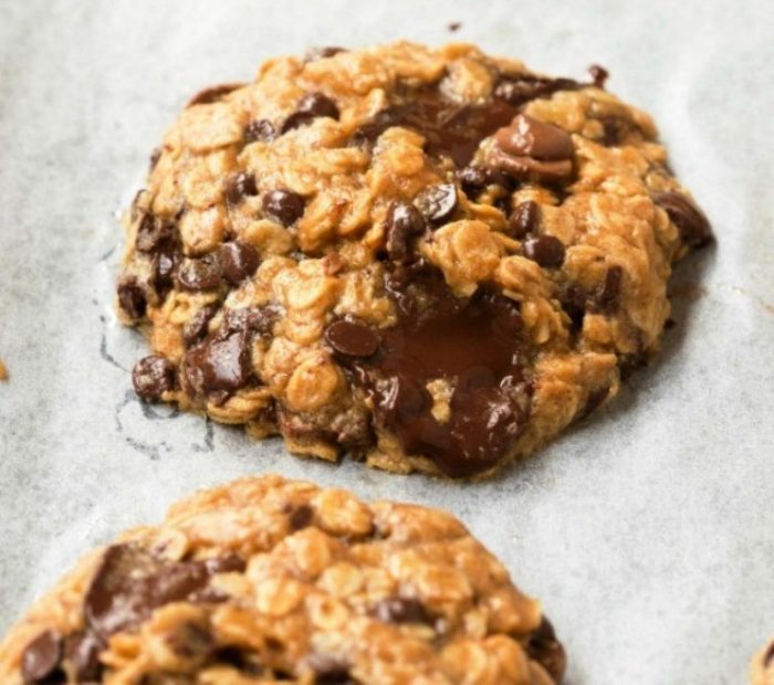 These healthy banana oatmeal breakfast cookies are made with peanut butter and no flour, but you’d never tell! Rolled oats, banana, and peanut butter are combined to make thick and chewy cookies. No eggs, no sugar and an option to make this without banana! 