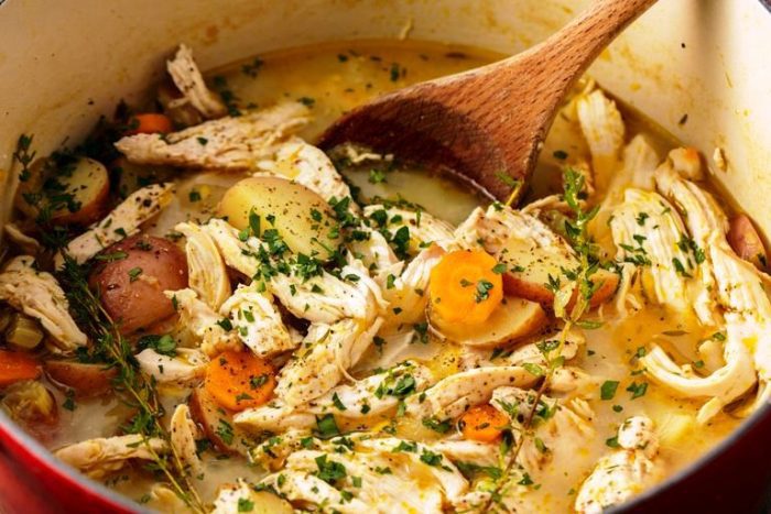 Cooking the chicken in the stew means that it releases all its juices into the broth as it cooks, giving the stew a ton of extra flavor.