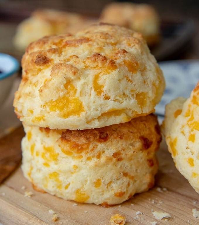 Gluten-free cheese scones are a savory, fluffy scone recipe flavored with cheddar cheese and garlic. If you love Red Lobster’s Cheddar Bay Biscuits, you will love this easy, flaky gluten-free copycat version!
