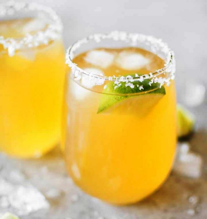 This passion fruit margarita recipe is quick, refreshing, and simple to make because it uses passion fruit juice. Perfect for sipping all summer!