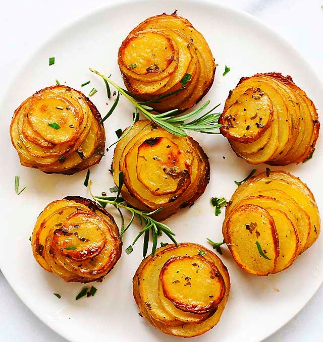 The most delicious Crispy Potato Stacks you'll ever make! These potatoes are buttery with the crispiest tops and bottoms while the center are soft and tender. This is the perfect side dish for everyday meal, holidays or special occasions