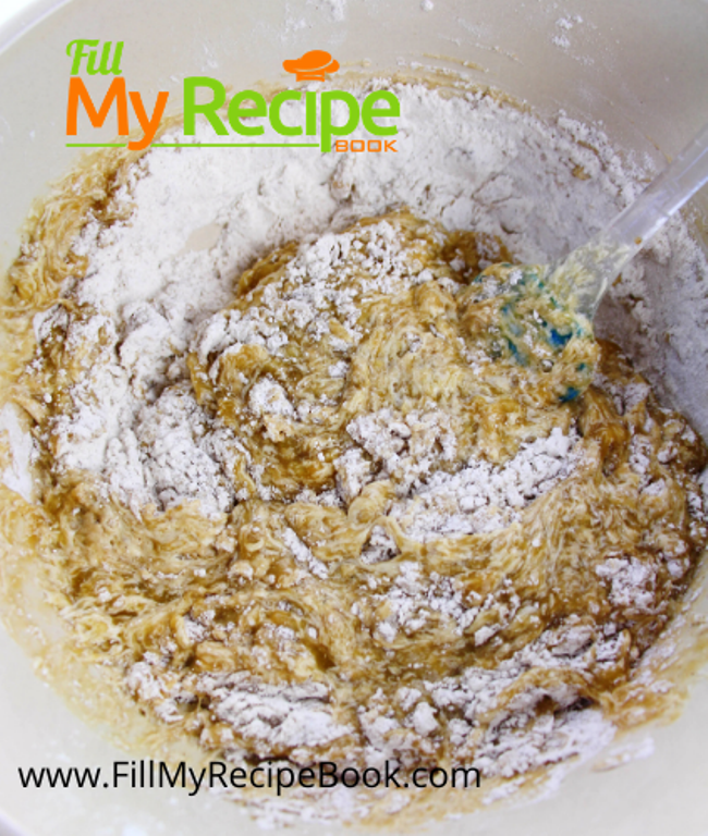 ingredients being mixed in a bowl for filling banana bread recipe.