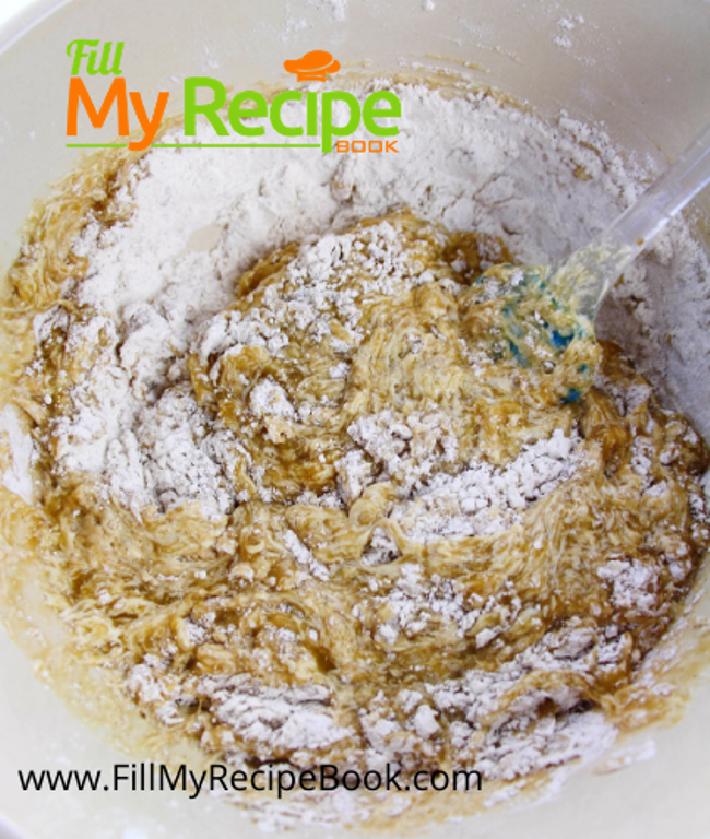 ingredients being mixed in a bowl for filling banana bread recipe. 