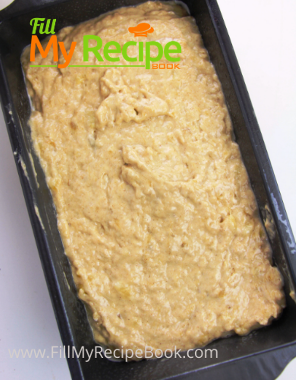 banana bread mixture placed in baking pan, filling banana bread