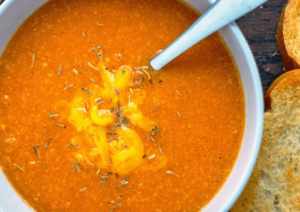 Roasted Tomato and Cheddar Soup. A wonderful and tasty warming tomato and onion and garlic roasted tomato and cheddar soup, for those winter days.