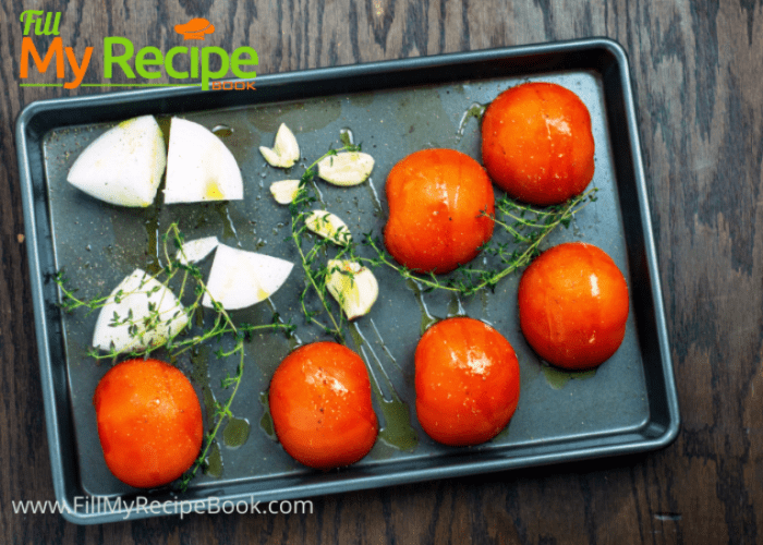 preparing to roast tomato and garlic and onion for soup