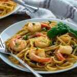 Sautéed Shrimp Scampi with Garlic recipe. Seafood shrimp sauté in butter with white wine and garlic and basil creamy sauce and lemon.