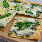 Quick and Easy Pesto Flatbread snack recipe. Healthy and tasty oven baked bread idea for appetizer or meal for a vegetarian or other.