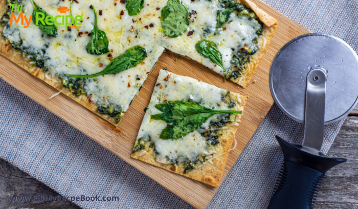 Quick and Easy Pesto Flatbread snack to make for a light supper. Healthy and tasty baked in minutes with basil pesto and topped with cheese.