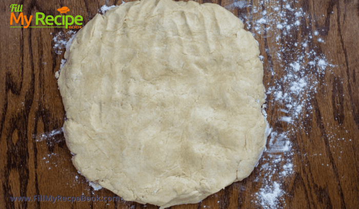 pressing the dough for buttermilk biscuits