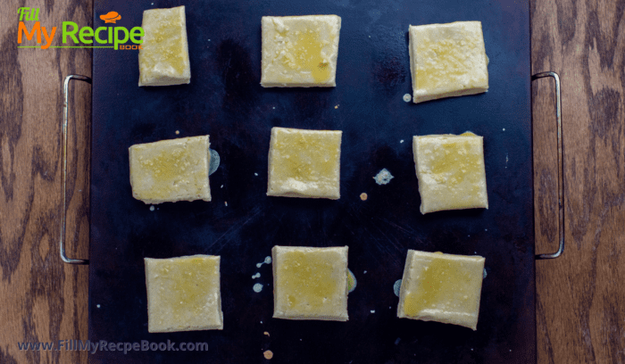 buttermilk biscuits to bake on a greased tray
