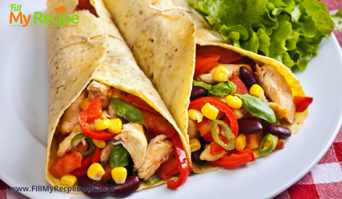 homemade and rolled tortilla filled with corn and black beans and salad as well and chicken