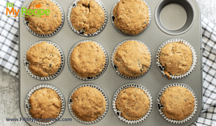 muffin pans with the baked zucchini muffins, Lemon Zucchini Muffins Gluten Free recipe. The best healthy muffin with bananas and almond butter, zucchinis for a snack or dessert.