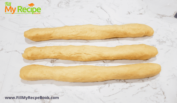 rolled out three pieces of dough for braiding of the brioche loaf