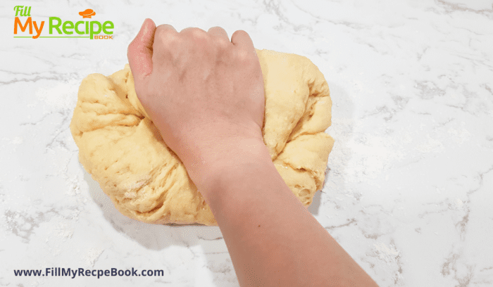 turning and kneading the dough mixture over and over
