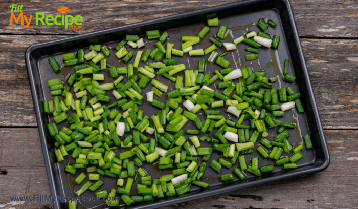 green onion cut into pieces and oiled to roast in a pan