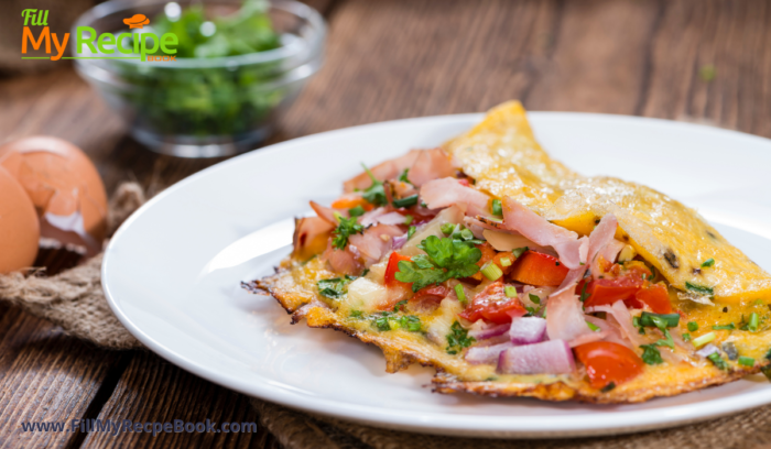 Cheese and Bacon Omelet recipe idea. Easy egg breakfast or brunch meal filled with cheese bacon or ham and bell peppers, onions.