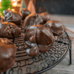 Chocolate and Peanut Butter Balls recipe. A no bake protein energy snack with peanut butter, mixed graham crackers covered in dark chocolate.