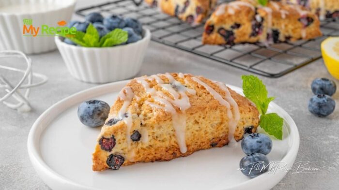 Tangy lemon glazed blueberry scones recipe are moist, buttery, and bursting with fresh berries. An easy homemade treat for afternoon tea.