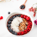 A Vegan Chocolate Raspberry Smoothie Bowl recipe. For an easy protein breakfast with all the fresh tasty berries and granola with honey.