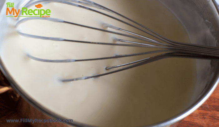 mixing and cooking the white sauce in a pot
