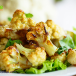 Oven Roasted Cauliflower Florets recipe. A sheet pan oven bake idea for caramalized bites of cauliflower for a delicious veggie for meals.