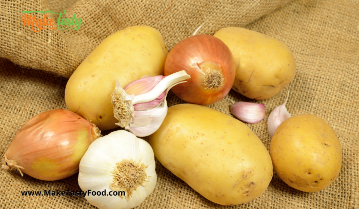 some ingredients for the stew like potato and onion and garlic