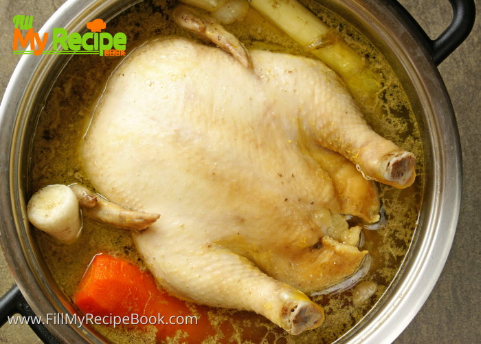 boiling the chicken and vegetables for soup.
