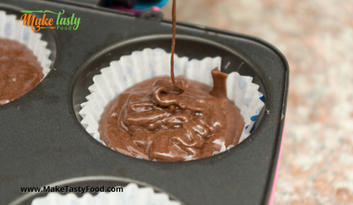 pouring the chocolate mix into cupcake and muffin pans