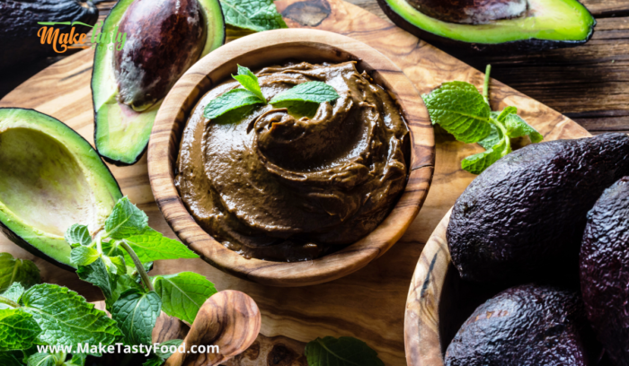 healthy avocado mousse in a wooden bowl
