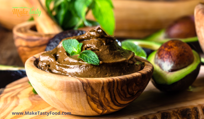 avocado mousse in a wooden bowl
