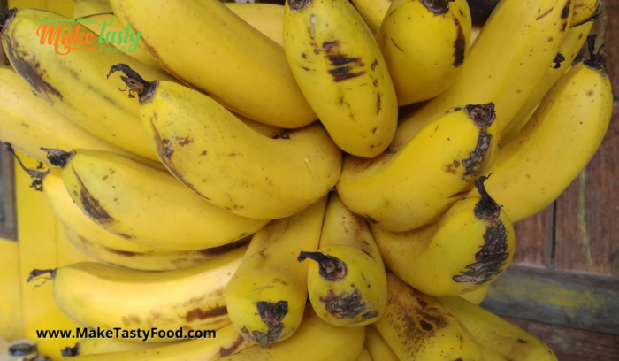 a bunch of ripe bananas hanging that ripened