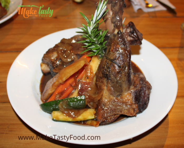 a lamb shank  potjie plated and ready to eat