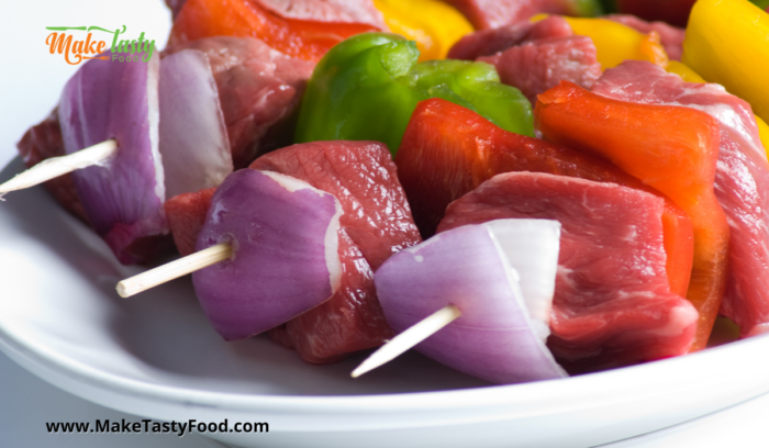made up beef sosaties with the onion and peppers diviving the beef on skewers