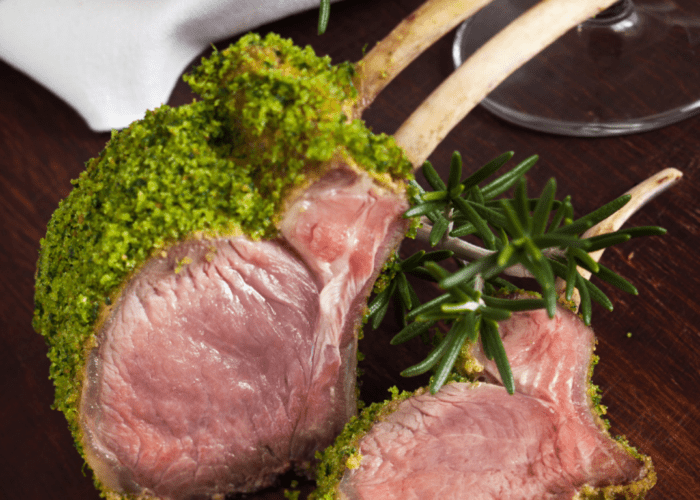 Herb Crusted Rack of Lamb Recipe for Upscale Dining. This exquisite dish features a lightly pan-seared rack of lamb, seasoned and coated in a flavorful Parmesan, herb crust, then baked in the oven to achieve perfection.