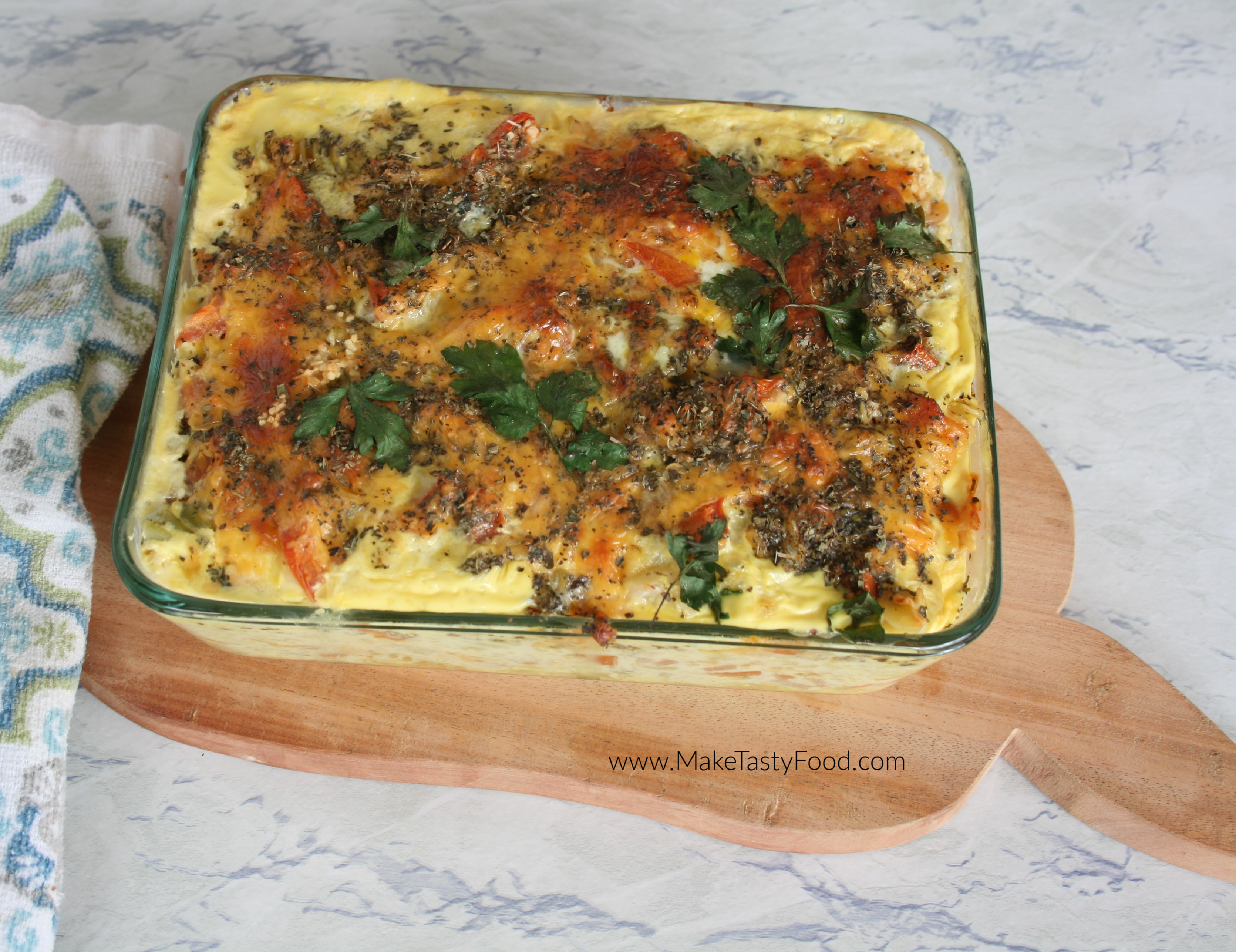 top view of the golden brown baked macaroni and cheese with parsley