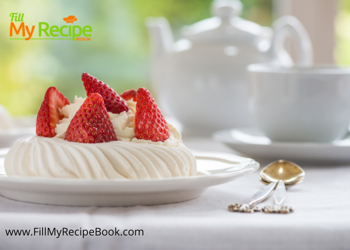 Mini Pavlova Strawberries and Cream recipe. A decadent dessert to bake and decorate with cream, strawberries for a tea or special occasion.