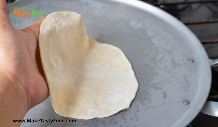 cooking the tortilla on a skillet 