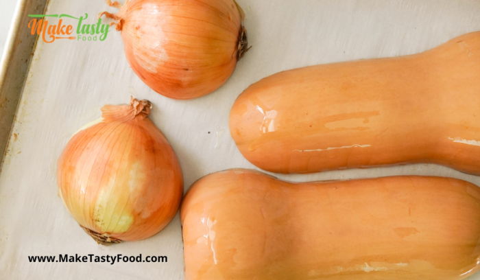 oiling the skin of the butternut on onion before roasting in the oven