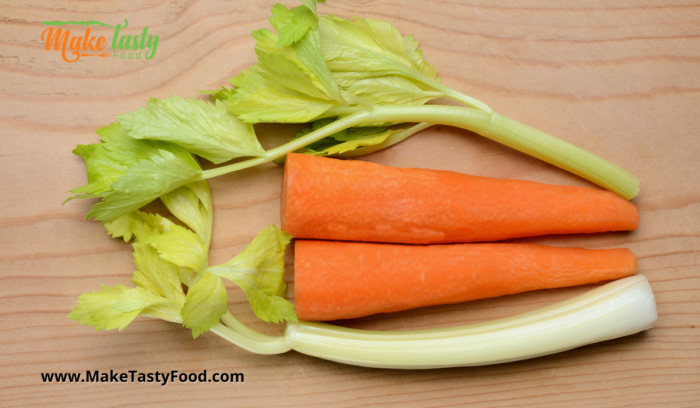 cut up the carrots and celery for the soup and cook it.