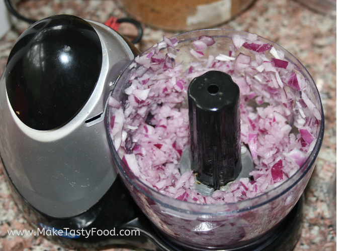 chopping up some red onions for potato salad