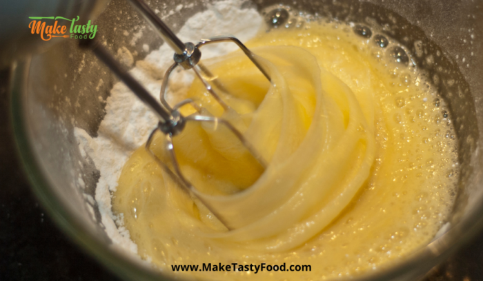 mixing the sugar and eggs thoroughly for make a perfect chocolate cake