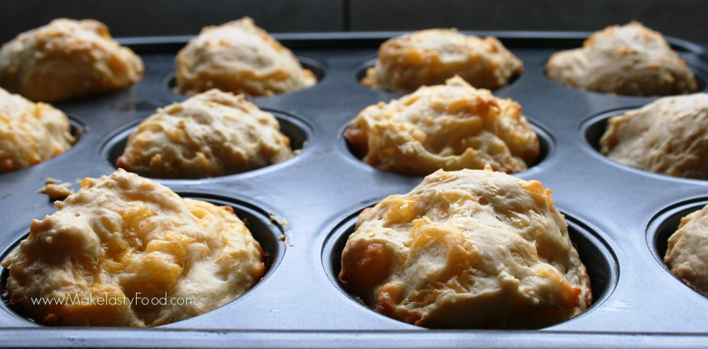 baked cheese scones in a muffin pan